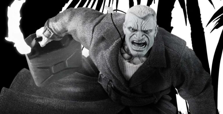 Figurine Sin City Marv One:12 Collective de Mezco Toyz représentant le célèbre anti-héros de Frank Miller avec son trench-coat et son arsenal d’armes